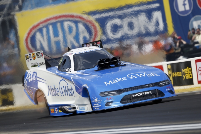 Funny Car pilot Tommy Johnson Jr. racing on Sunday at the Route 66 NHRA Nationals